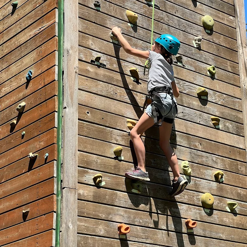 kid climbing rock wall